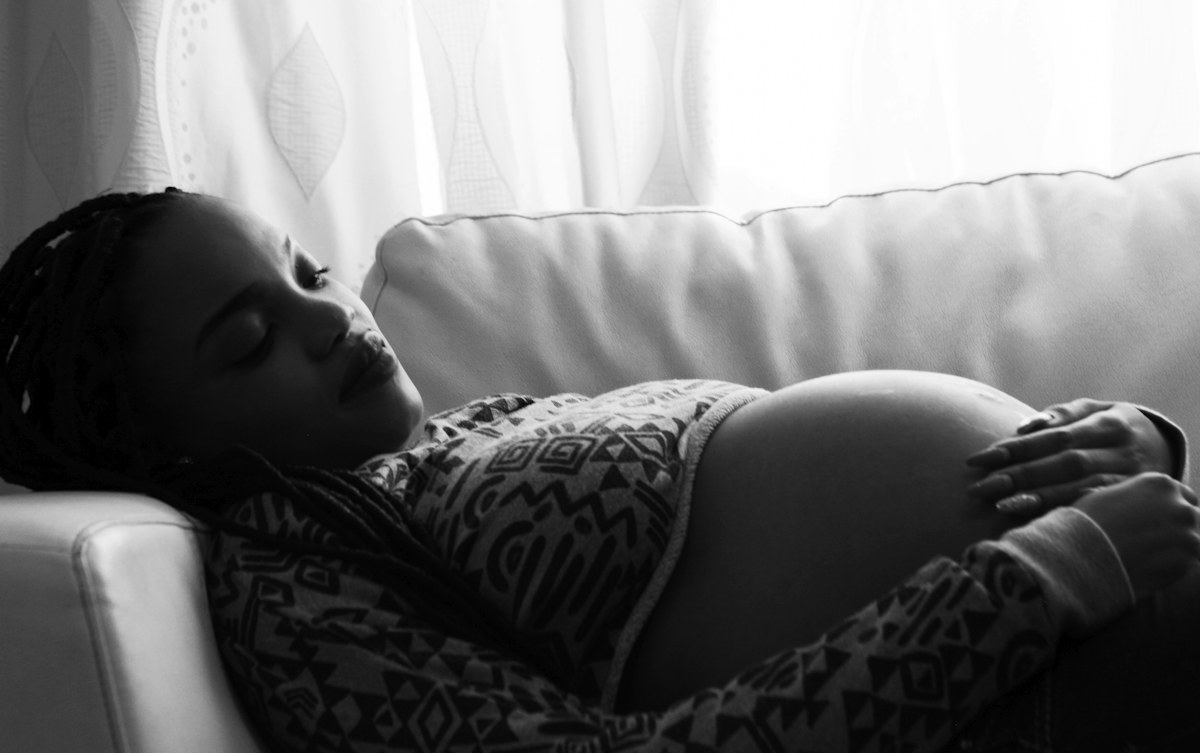 Pregnant woman resting at home during pregnancy.