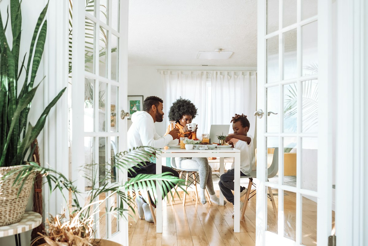 Family gathered at a dining table.