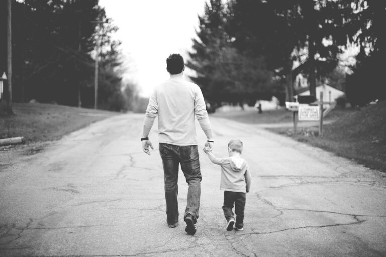 Father spending a caring moment with his toddler.